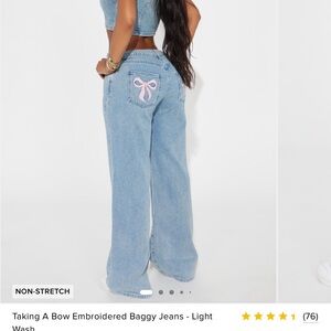 Light Blue Jeans with Pink Bow